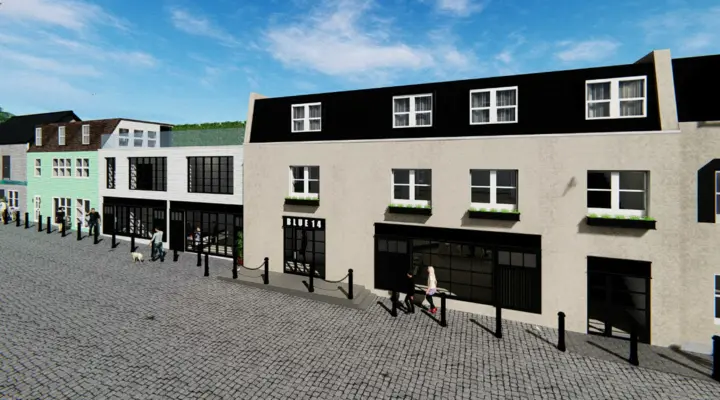 A render of a three-storey, light brick-fronted building.